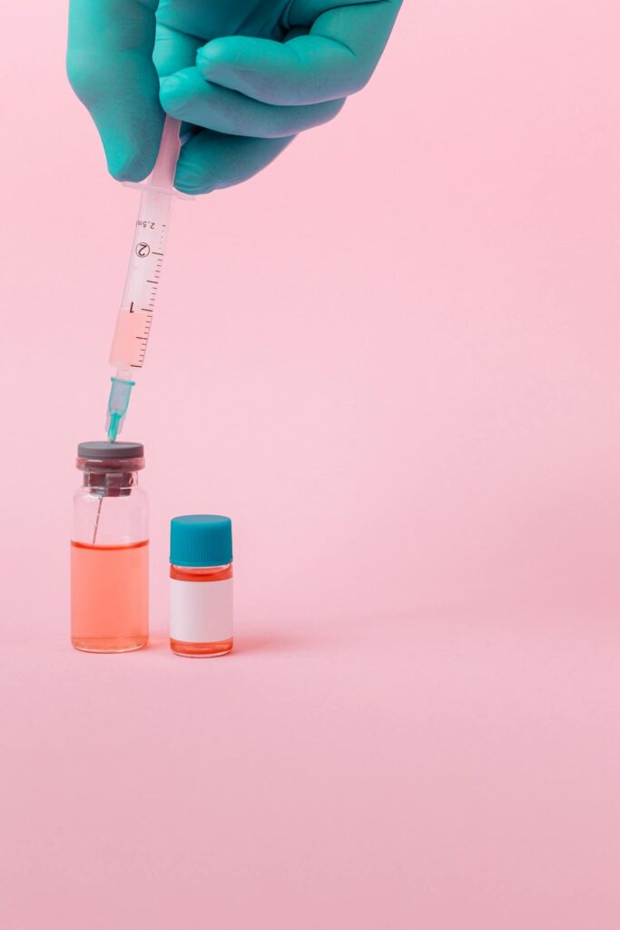 close up of doctor using injection medicine, vitamin d injections